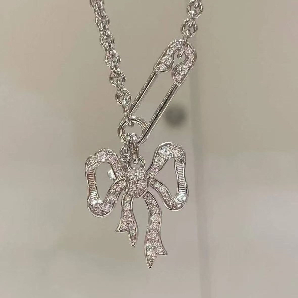 Bow chain necklace and earrings