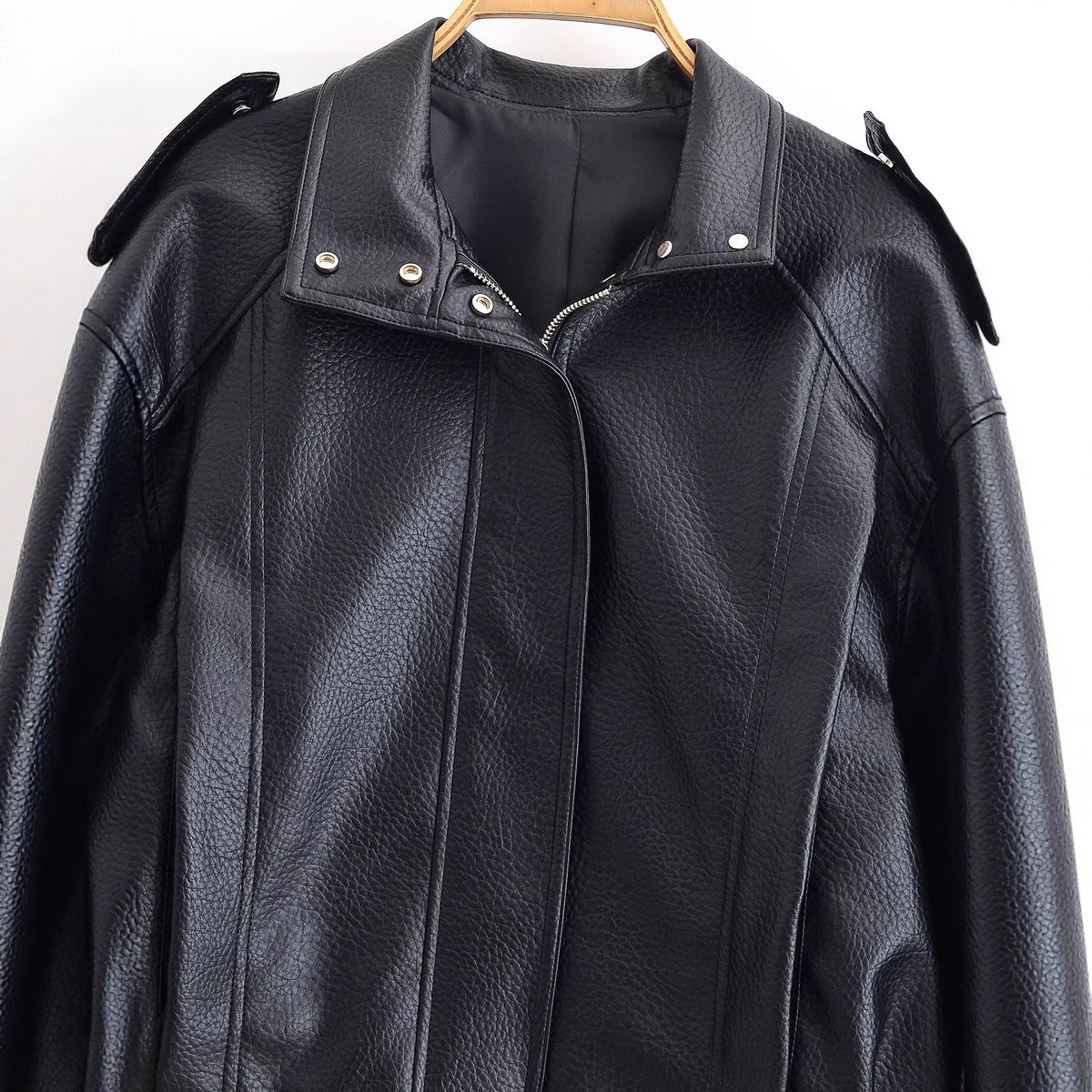 Falling shoulder lychee patterned imitation leather jacket