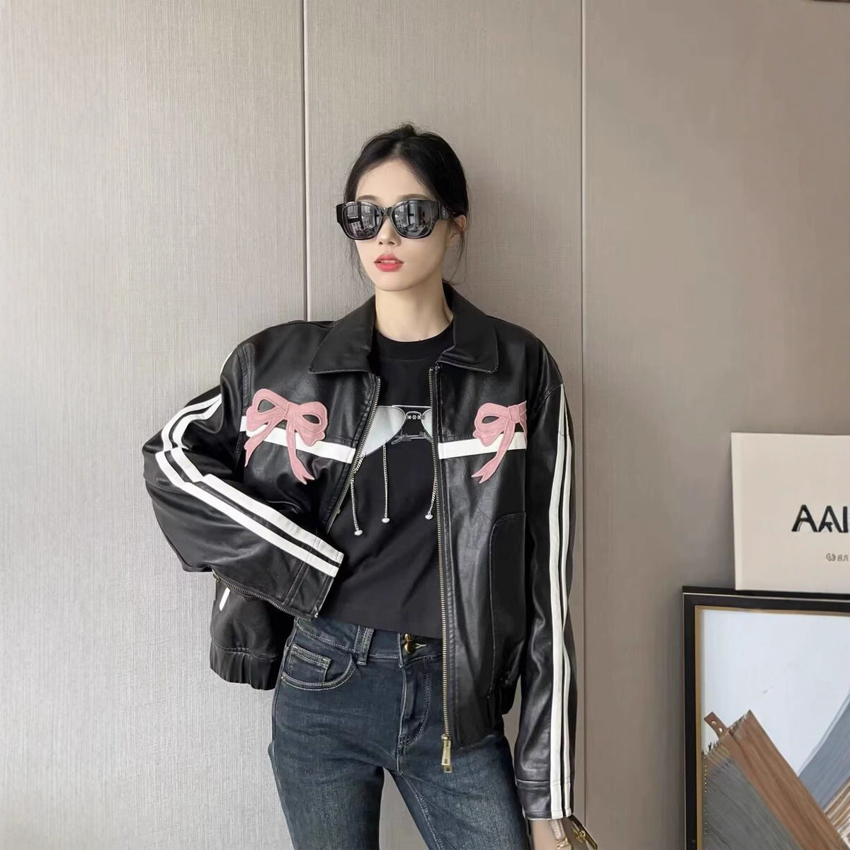 Bow embroidered leather jacket