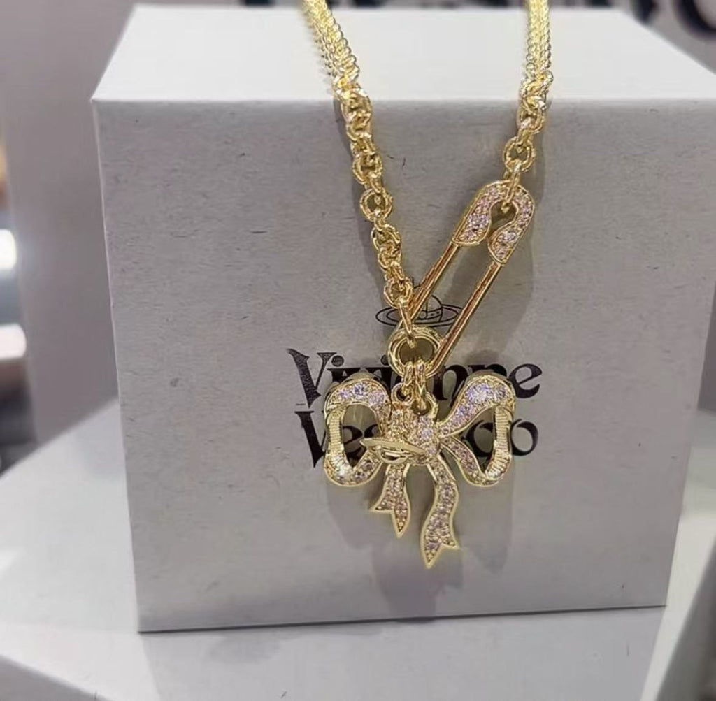 Bow chain necklace and earrings