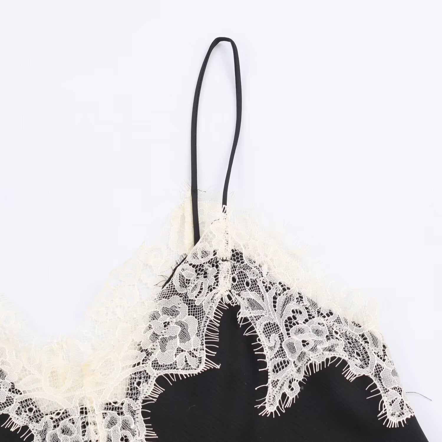 Color blocked lace satin textured top