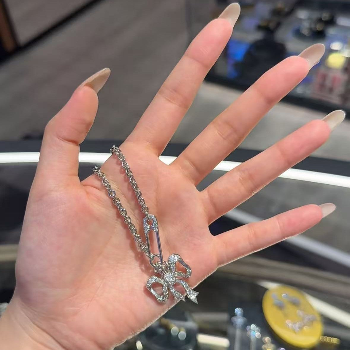 Bow chain necklace and earrings